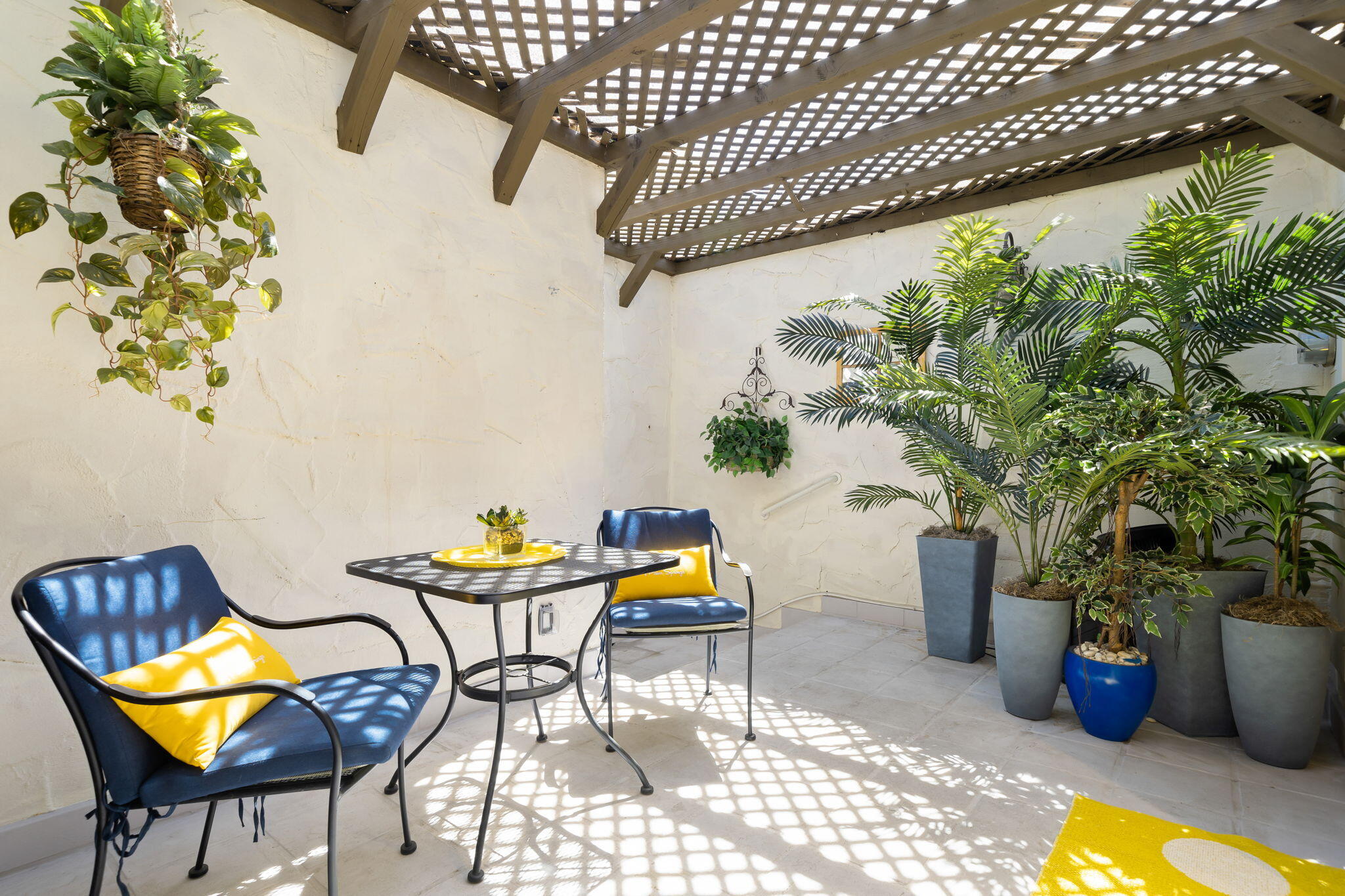 1757 Ramon Road, Unit 40 Palm Springs, CA 92264 - Photo 7 of 20 a backyard of a house with table and chairs