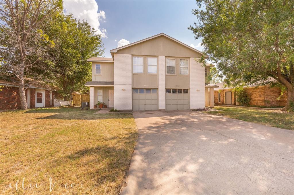 1417 Yeomans Road Abilene, TX 79602 - Photo 1 of 1 a front view of a house with a yard
