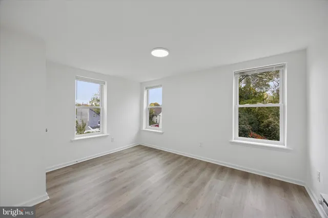 a bathroom with a sink a toilet and a bathtub