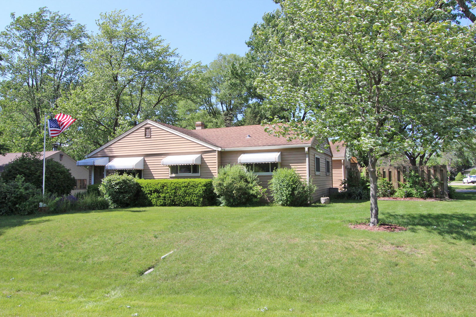 48 Golfview Road Lake Zurich, IL 60047 - Photo 2 of 34 a front view of a house with garden