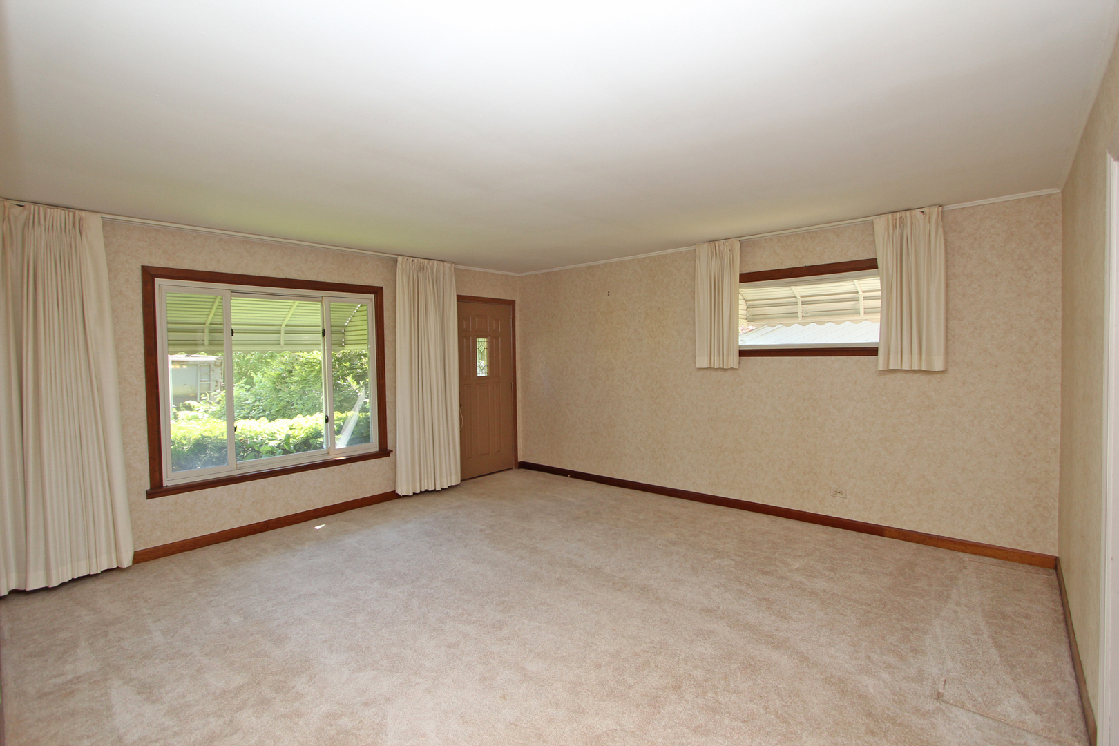 48 Golfview Road Lake Zurich, IL 60047 - Photo 3 of 34 an empty room with windows