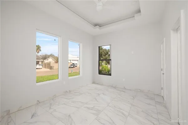 an empty room with windows