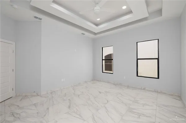 an empty room with windows