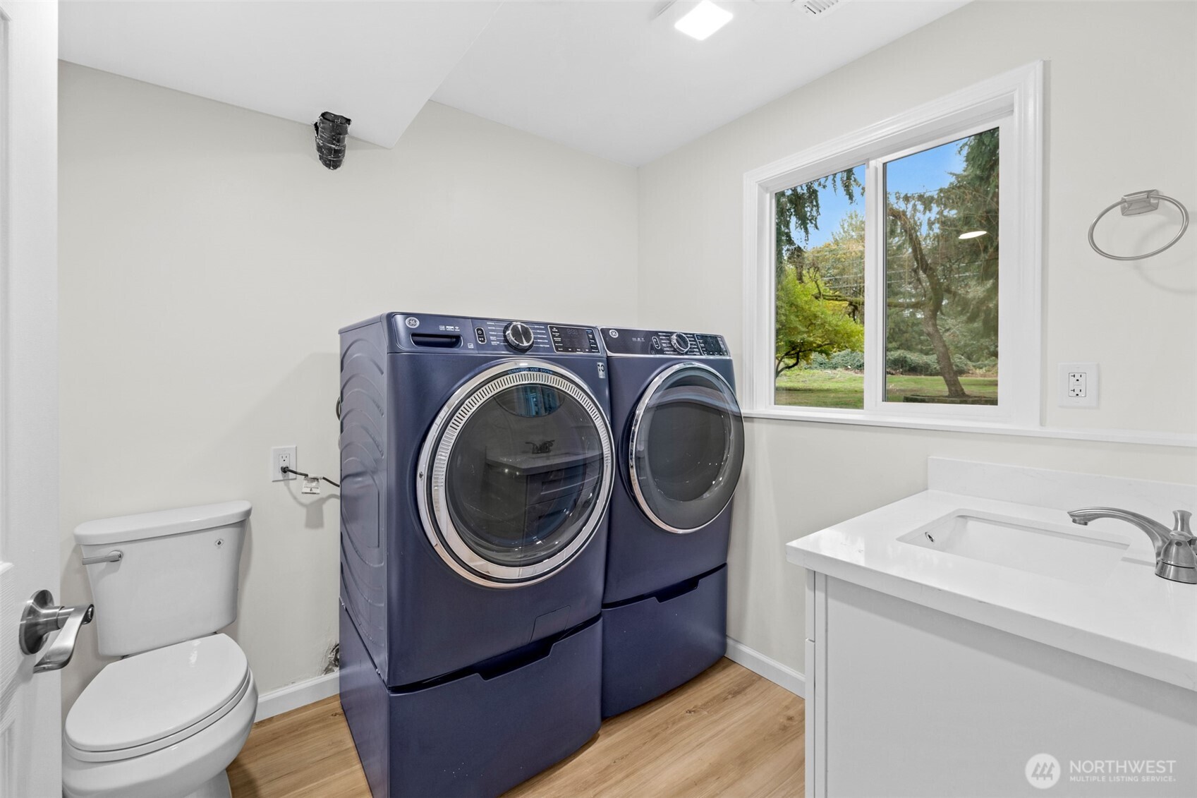 2400 177th Street Southeast Bothell, WA 98012 - Photo 19 of 29 a bathroom with a toilet sink and mirror