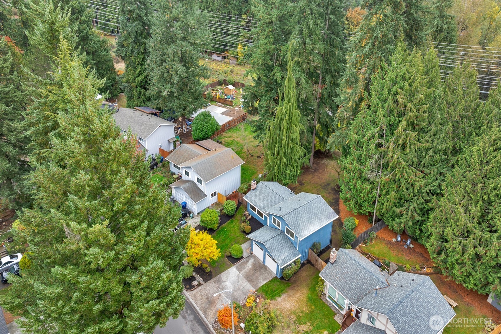 2400 177th Street Southeast Bothell, WA 98012 - Photo 25 of 29 an aerial view of a house with swimming pool and garden