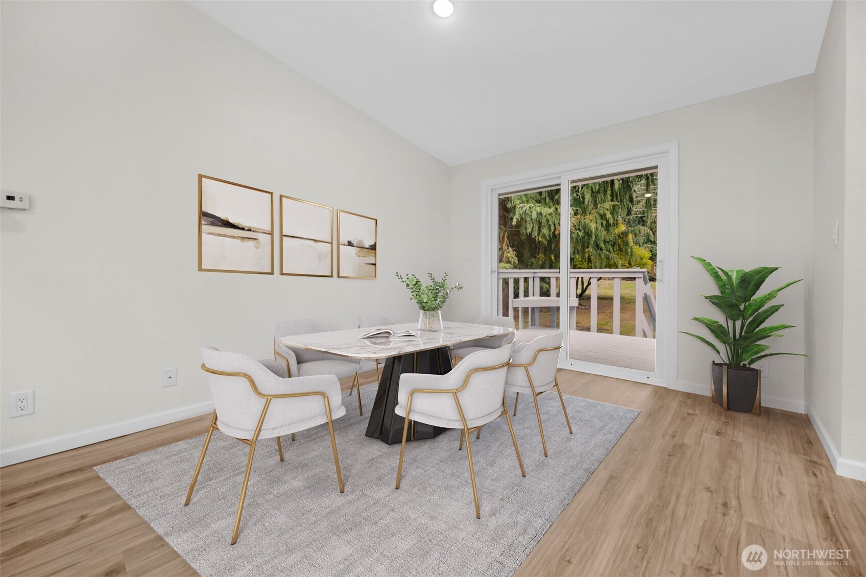 2400 177th Street Southeast Bothell, WA 98012 - Photo 10 of 29 a view of a dining room with furniture window and wooden floor