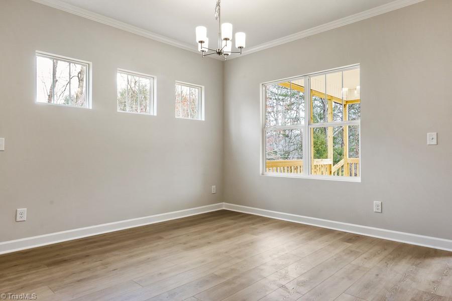 7708 Sedgewick Ridge Road Lewisville, NC 27023 - Photo 11 of 45 Dining Area. Craftsman Style Windows for additional furniture to be placed underneath