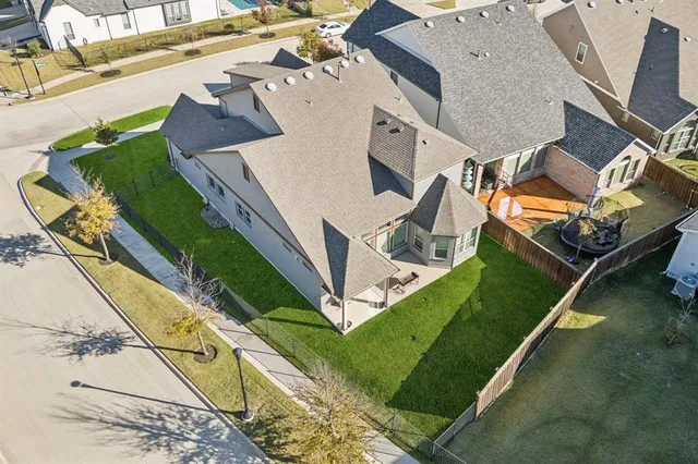 an aerial view of a house with garden