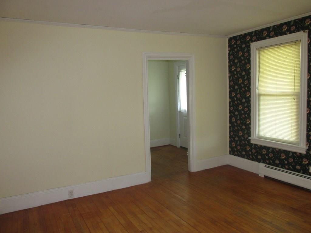 99 Back Searsport Road Belfast, ME 04915 - Photo 10 of 30 The front room features hardwood...