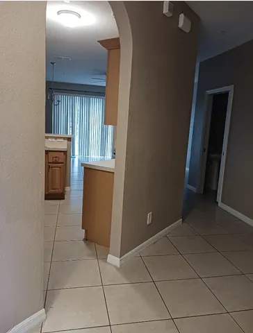 a view of kitchen and utility room