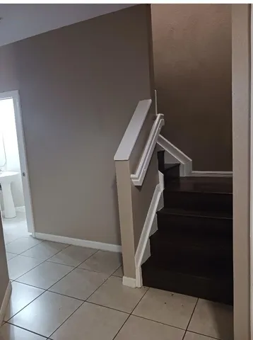 a view of entryway with stairs