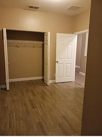 an empty room with closet