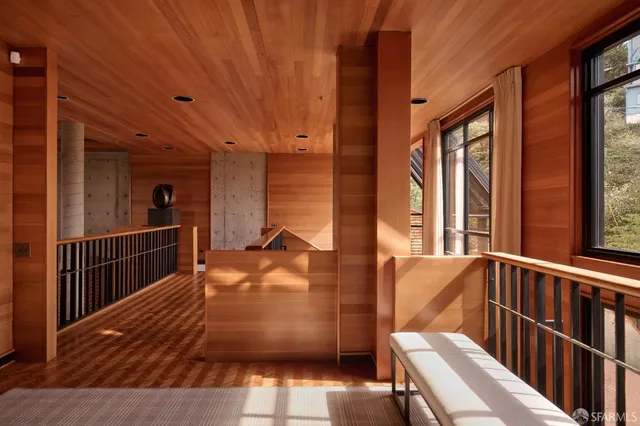 a view of a balcony with furniture