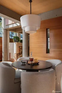 a view of a balcony with furniture