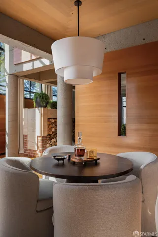 a view of a balcony with furniture