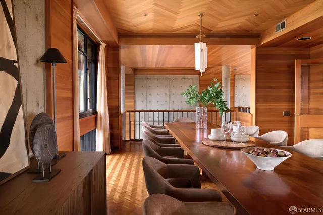 a view of a living room with furniture and window