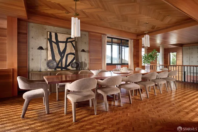 a view of a living room with furniture and window