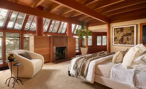 a living room with a couch and a table