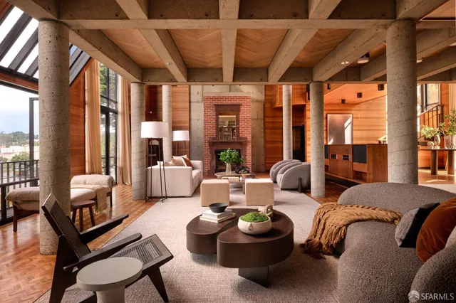 a view of a livingroom with furniture and a couch