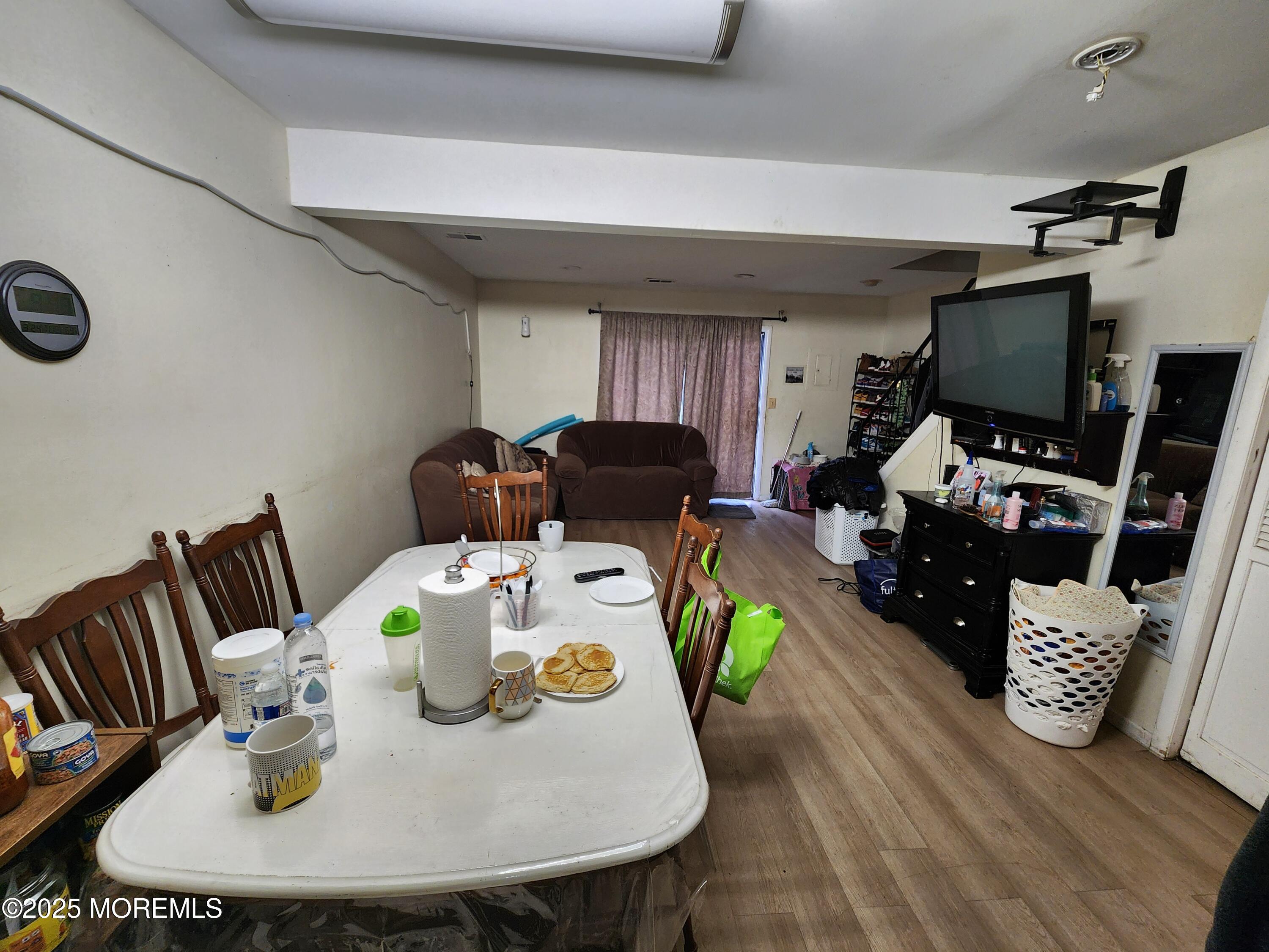 1102 Sawmill Road, Unit 99 Brick, NJ 08724 - Photo 6 of 13 a view of a dining room with furniture