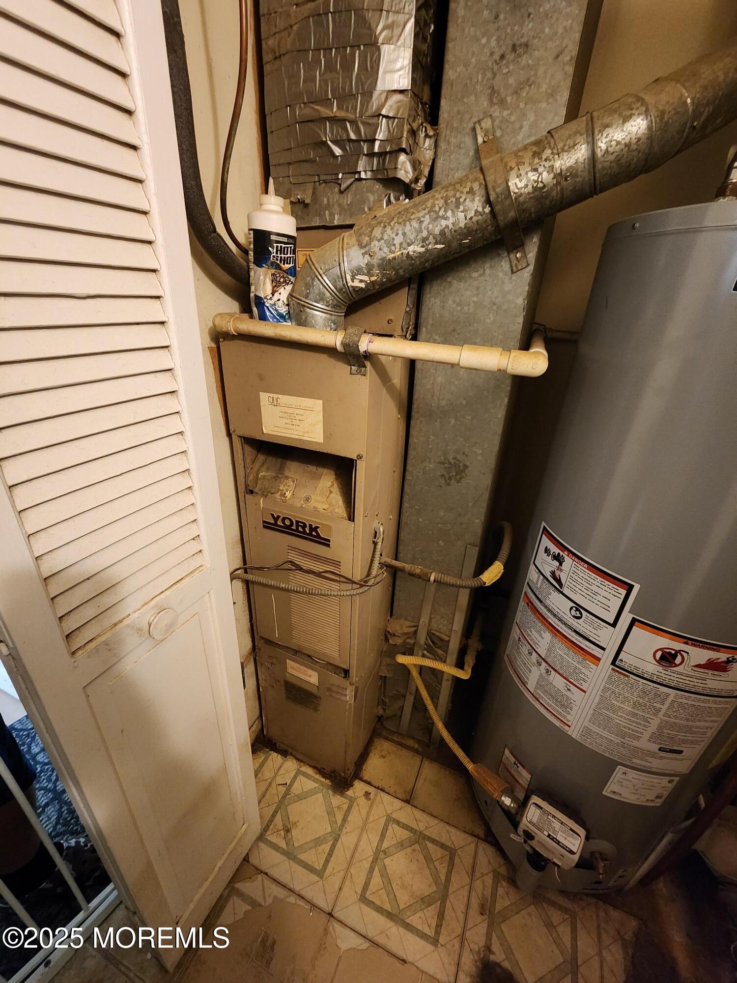 1102 Sawmill Road, Unit 99 Brick, NJ 08724 - Photo 8 of 13 a utility room with dryer and washer