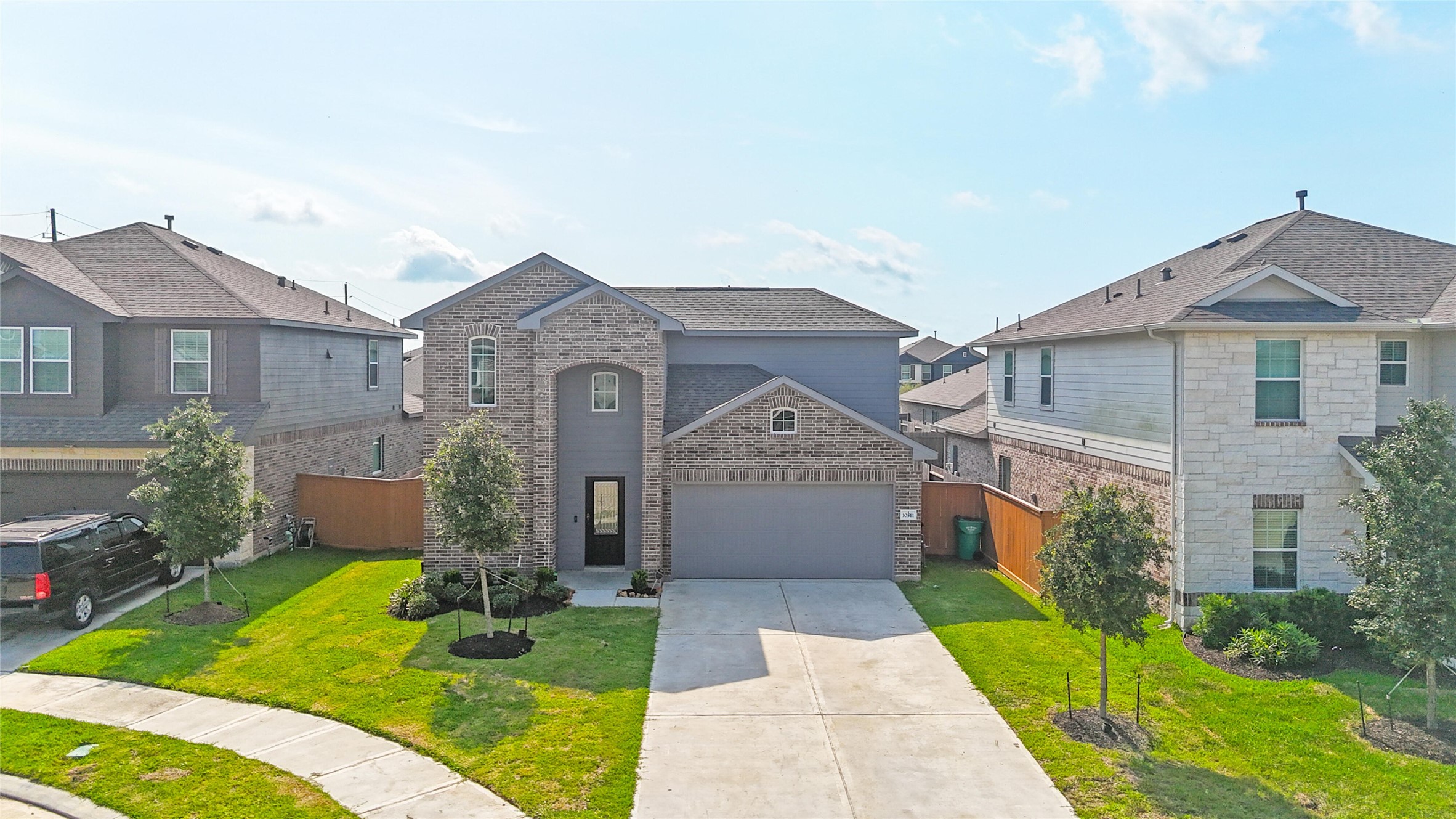 10511 Kings River Drive Rosharon, TX 77583 - Photo 1 of 25 a front view of a house with garden
