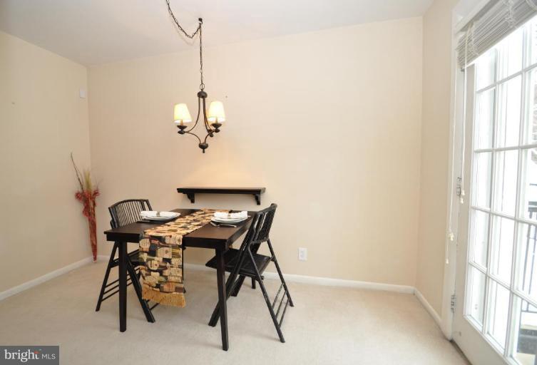 4620 28th Road South, Unit B Arlington, VA 22206 - Photo 14 of 18 a view of a dining room with furniture window and outside view