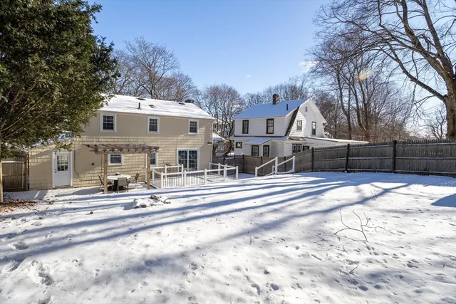 a view of a street with houses on the side