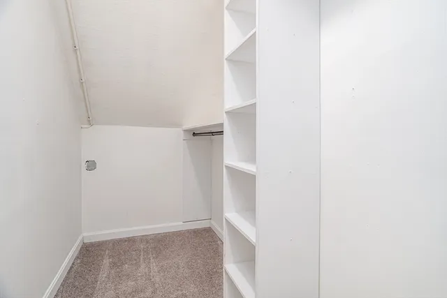 a view of a storage & utility room with washer and dryer