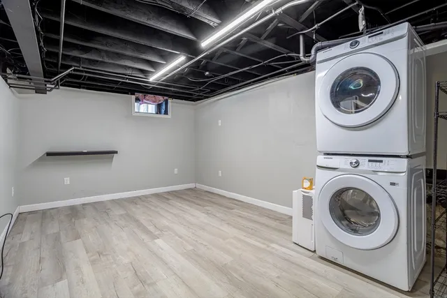 a utility room with a sink a washer and dryer