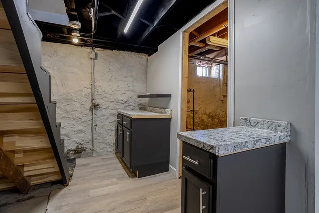 a view of a patio with a table and chairs