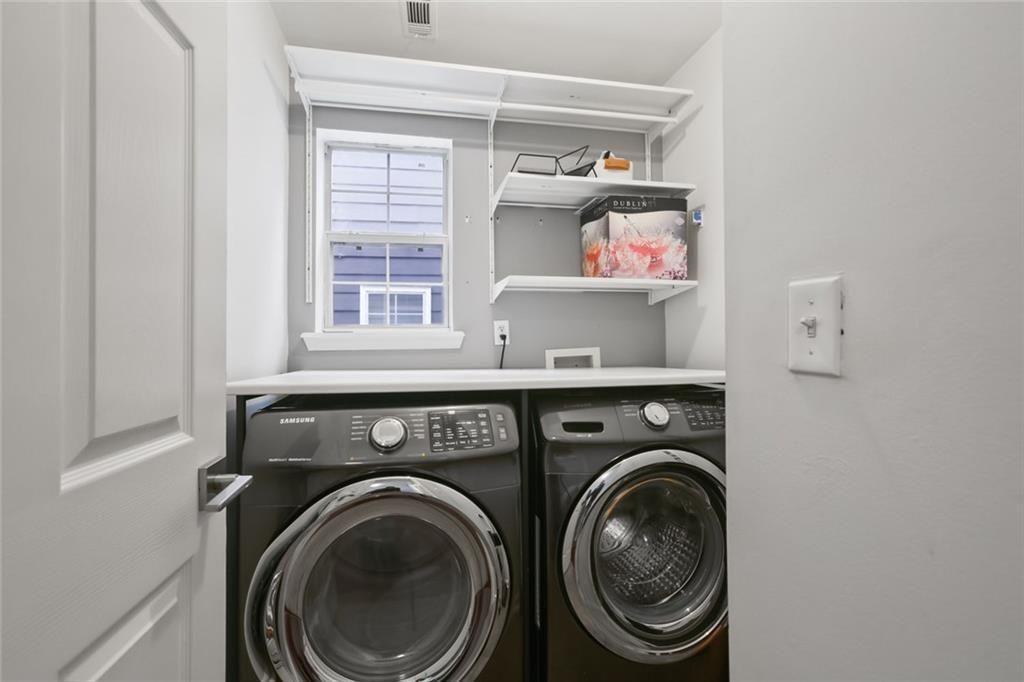 1464 Gates Circle Southeast Atlanta, GA 30316 - Photo 20 of 26 a utility room with dryer and washer