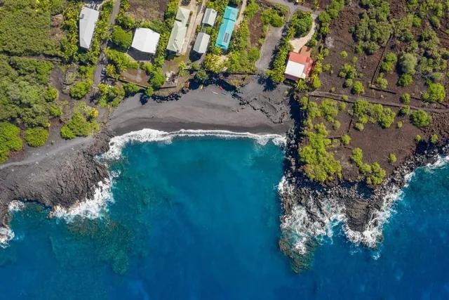 a view of a pathway with a garden