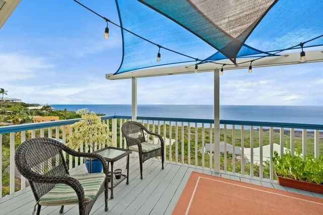 a view of a balcony with couch
