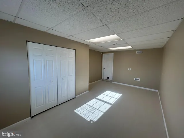 a bathroom with a sink toilet and mirror