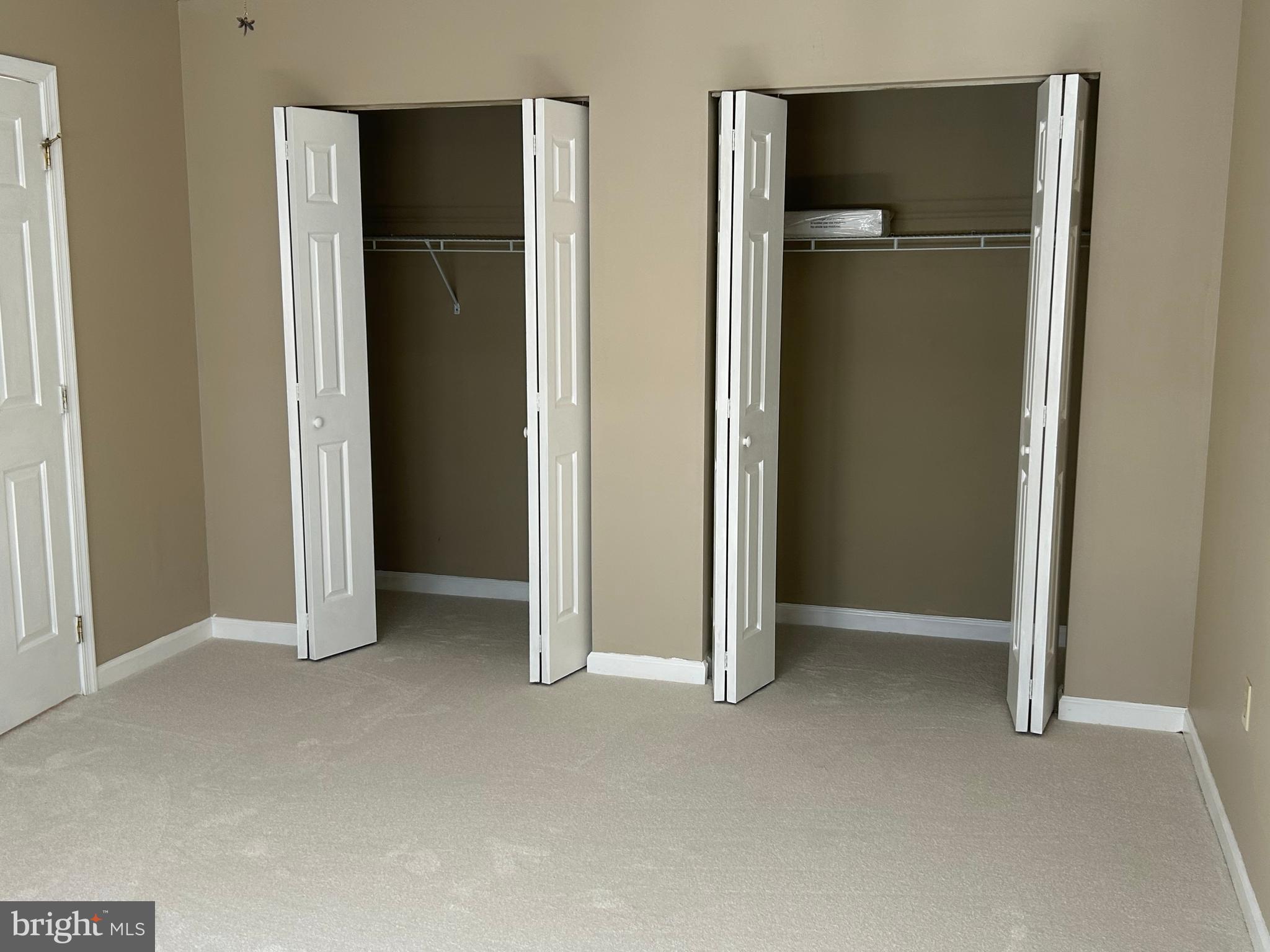 3056 Solar Drive Dover, PA 17315 - Photo 29 of 43 an empty room with closet and wooden door