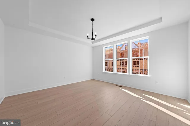 a bathroom with a shower sink vanity granite and mirror