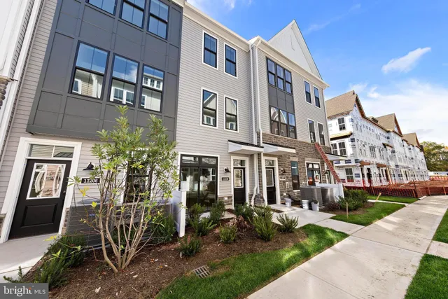 a view of a building with a yard