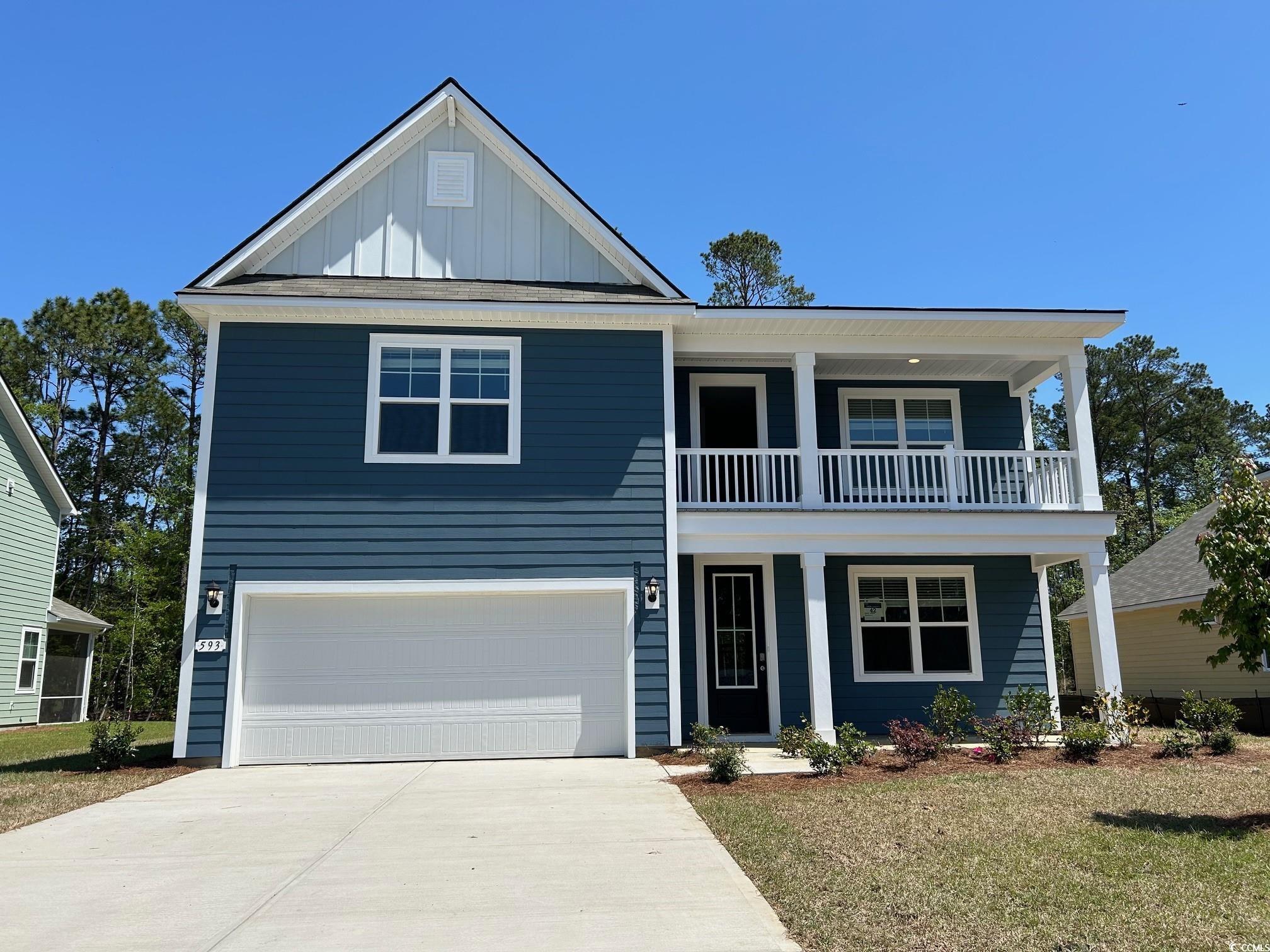 593 Haven View Way Murrells Inlet, SC 29576 - Photo 1 of 16 Traditional-style home featuring a balcony, board