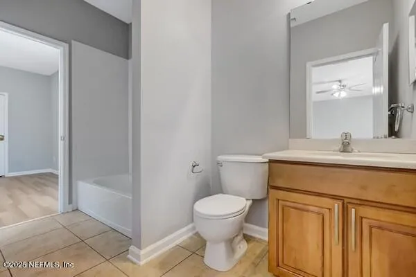 a view of a kitchen with a sink and chandelier
