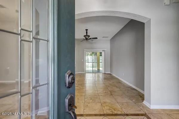 a view of livingroom with hardwood floor and a ceiling fan