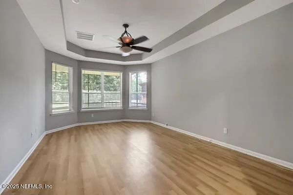 a view of an empty room and window