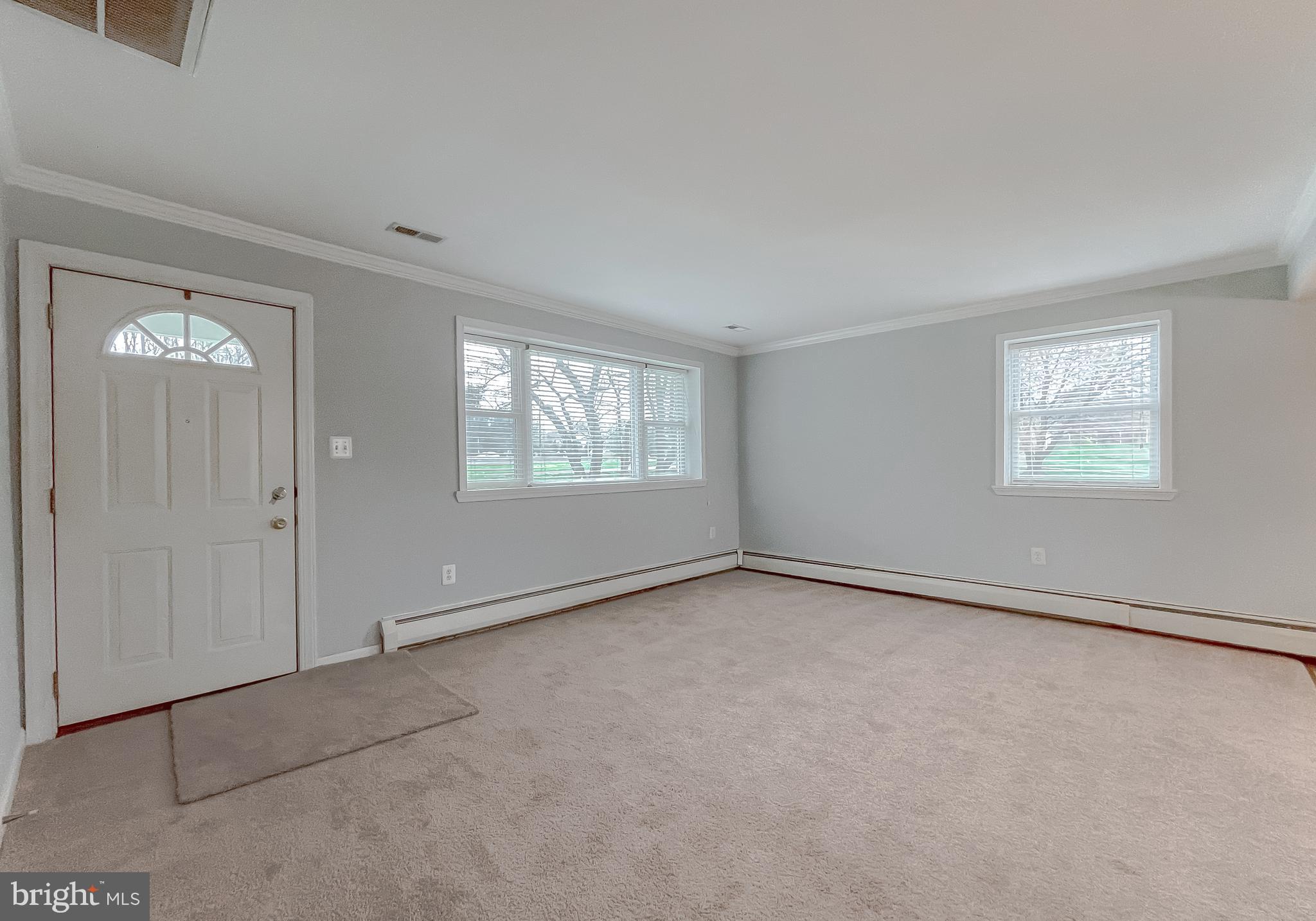4485 Solomons Island Road Huntingtown, MD 20639 - Photo 18 of 46 a view of an empty room with a window