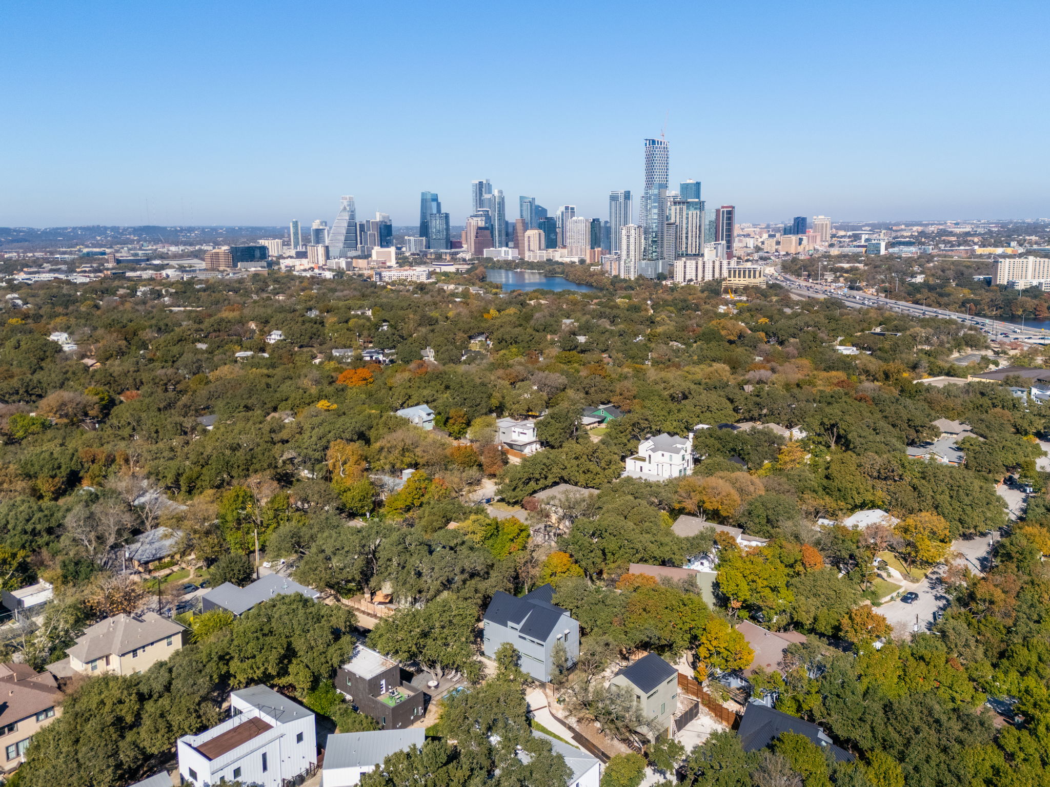 1603 Chelsea Lane, Unit 1 Austin, TX 78704 - Photo 32 of 34 Majestic skyline vistas rise above a lush canopy of mature trees surrounding the property.