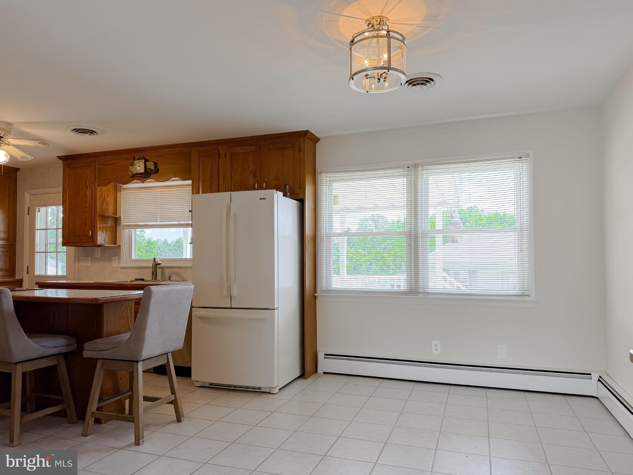 23230 Colton Point Road Avenue, MD 20609 - Photo 13 of 63 Bright and inviting kitchen space.