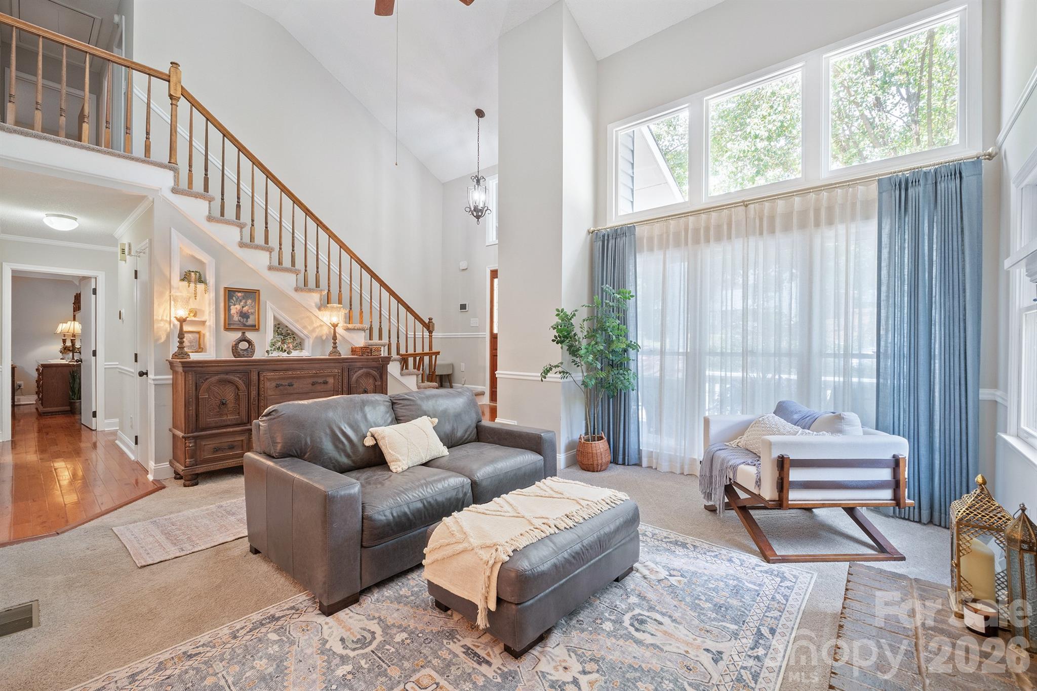 19017 Kailua Circle Tega Cay, SC 29708 - Photo 2 of 46 a living room with furniture and a large window