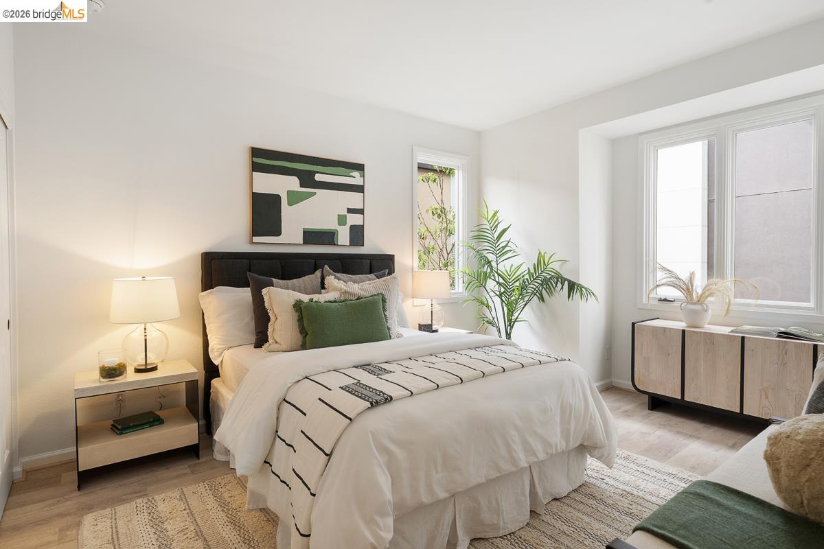 2029 Channing Way, Unit 3D Berkeley, CA 94704 - Photo 28 of 54 Bright room with wood-finish flooring and white walls