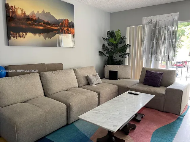 a view of a chairs with wooden floor