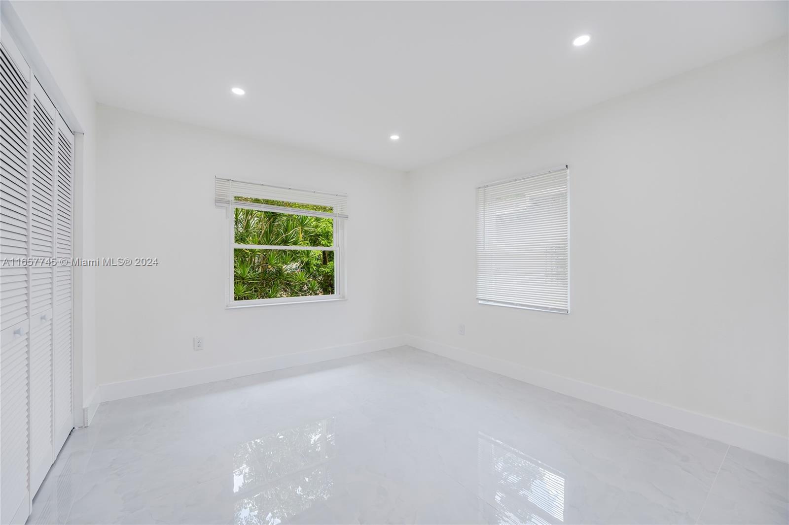 4802 Northwest 11th Avenue Miami, FL 33127 - Photo 15 of 26 an empty room with windows