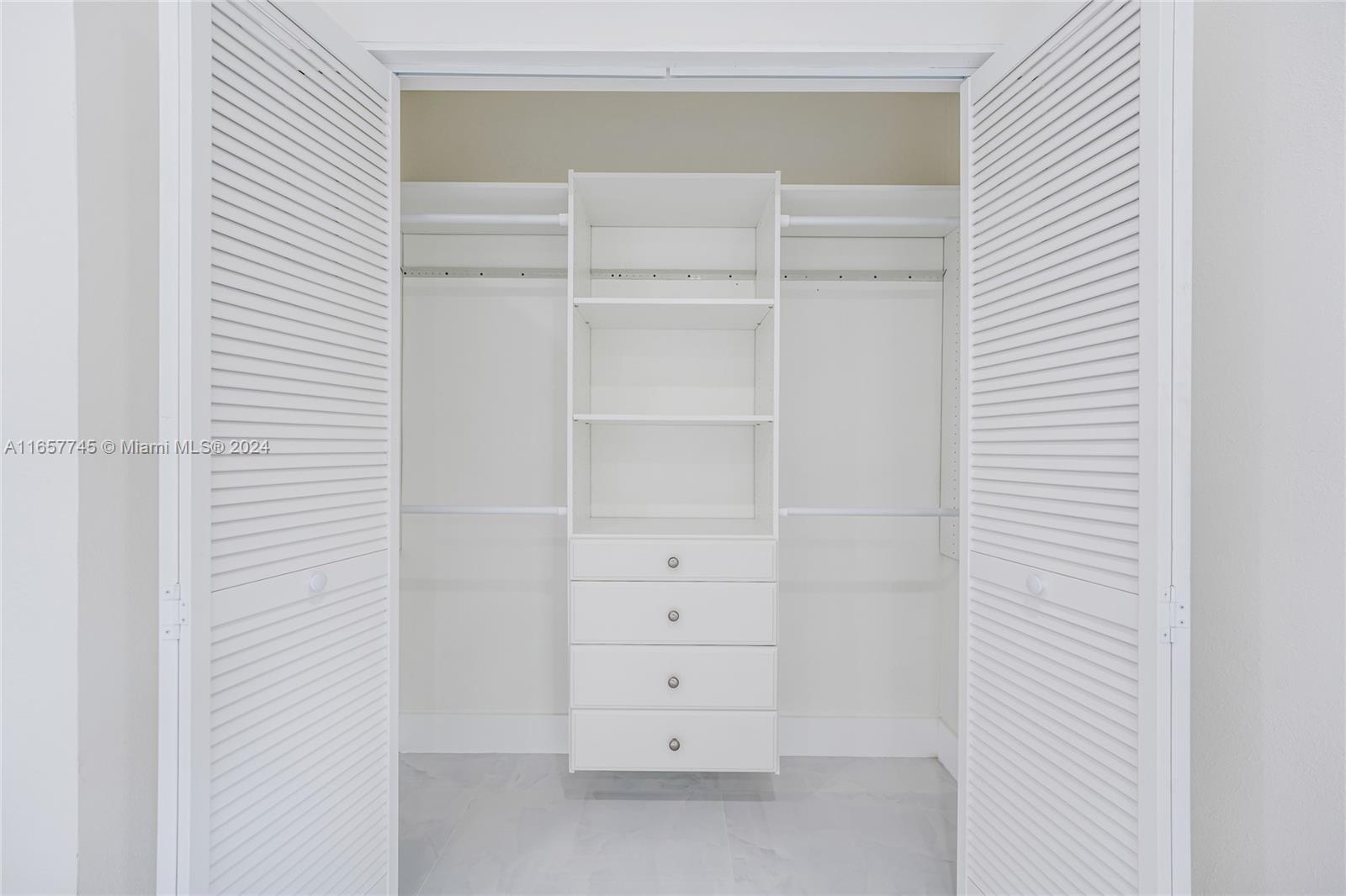 4802 Northwest 11th Avenue Miami, FL 33127 - Photo 16 of 26 a view of an empty walk in closet